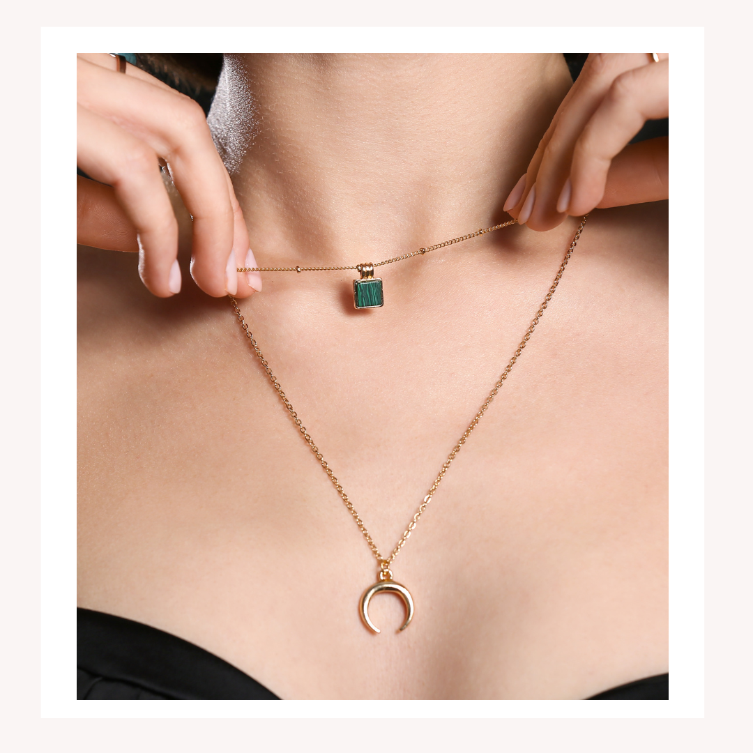 Pair jewelry with outfits you already own: colorful mix of statement and delicate pieces styled together